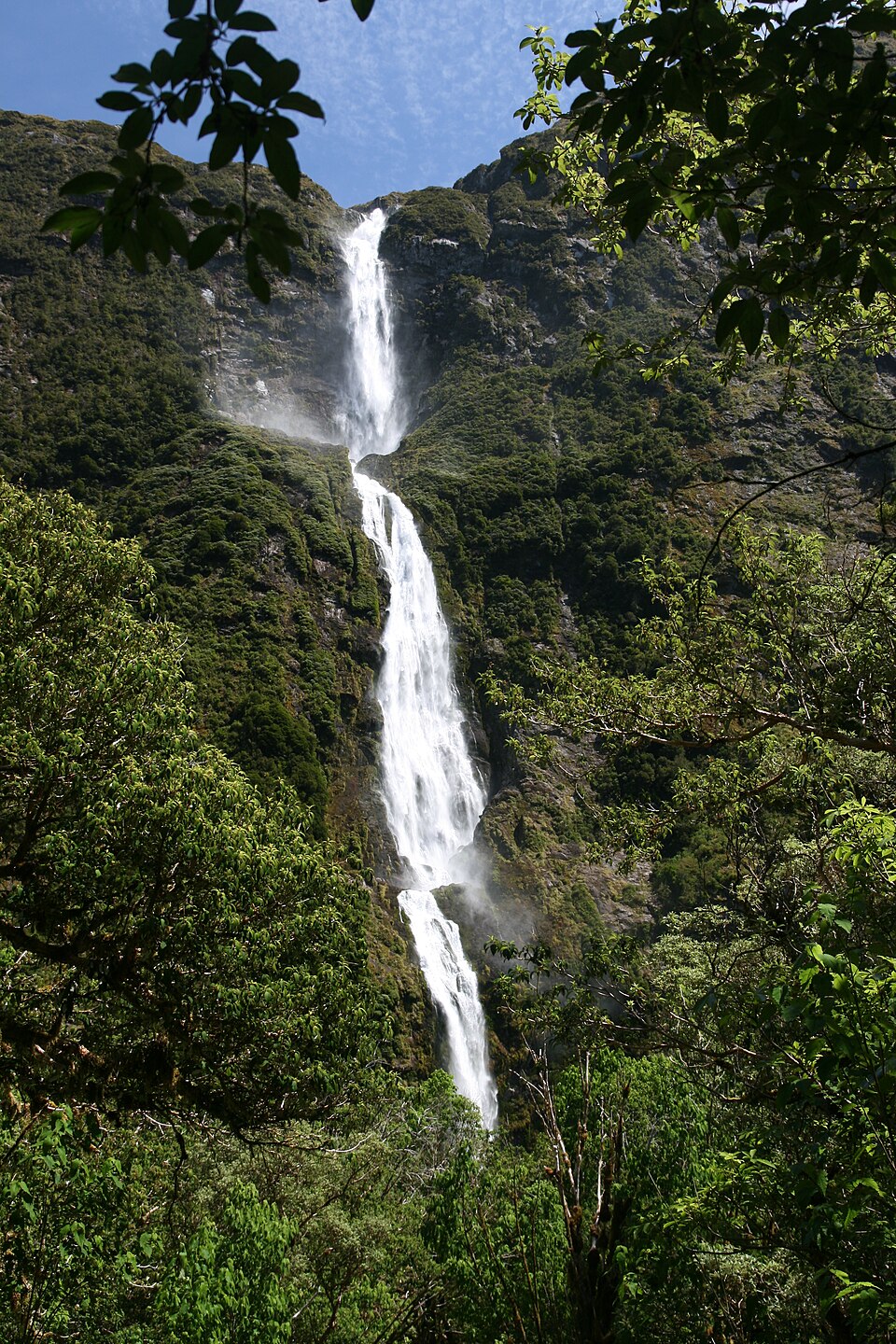 Sutherland Falls 580 metre three tier waterfall in Fiordland New Zealand