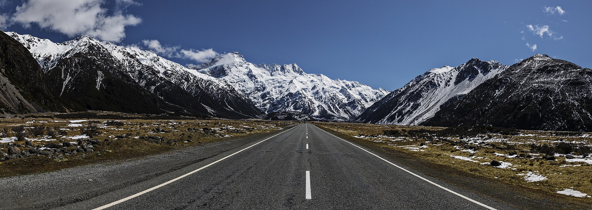 Lindis Pass mountain road winding through the New Zealand high country